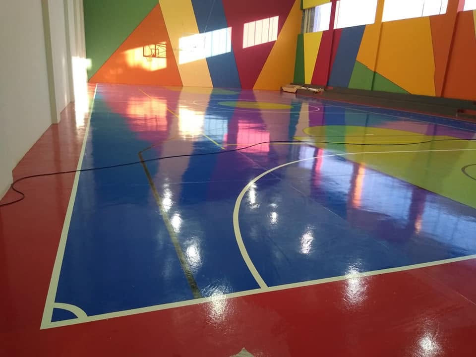 Quadra poliesportiva — tratamento e polimento de piso